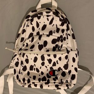 Champion UO Exclusive cow print Mini Backpack